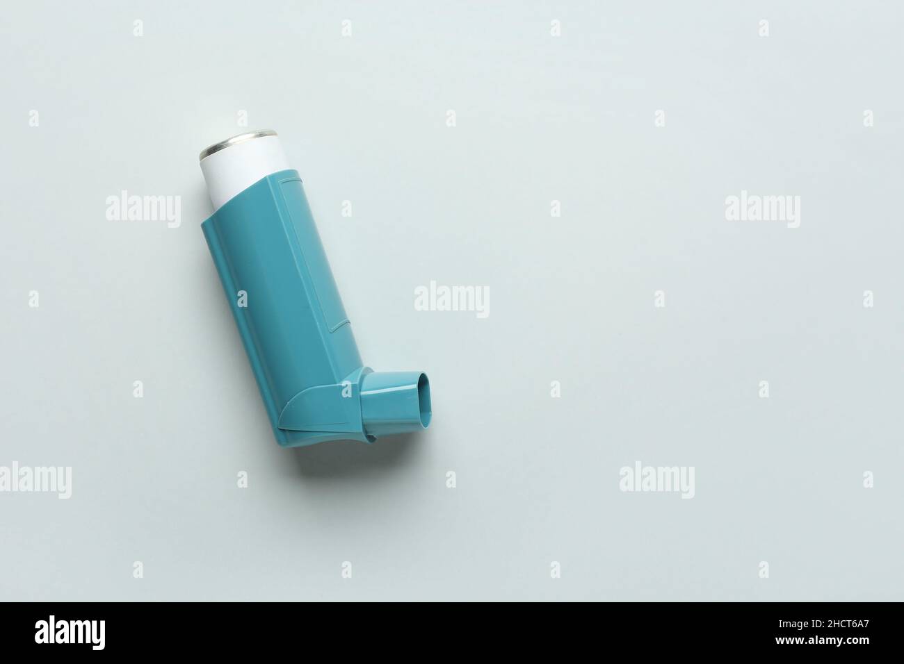 Modern asthma inhaler on grey background Stock Photo Alamy
