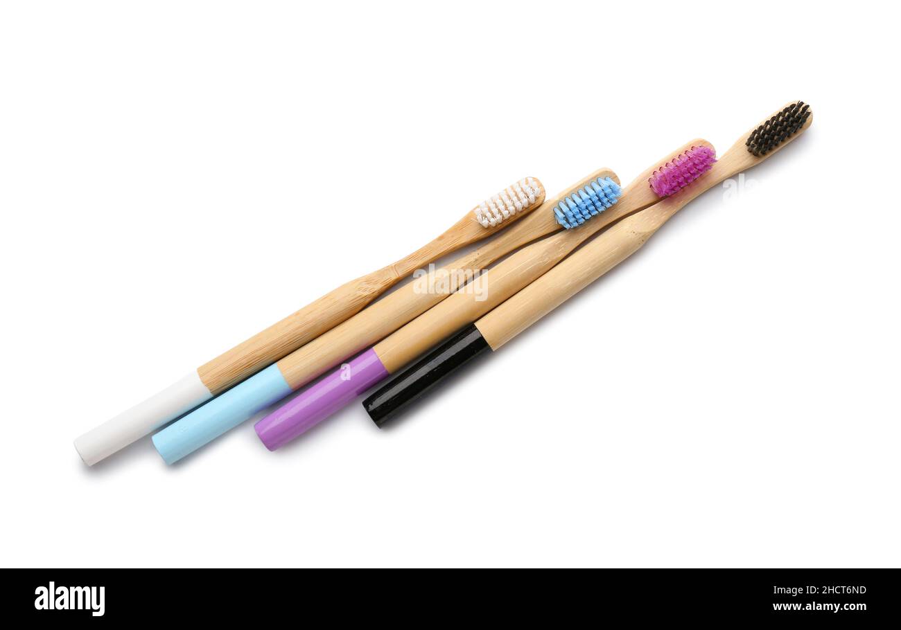 Bamboo toothbrushes on white background Stock Photo - Alamy