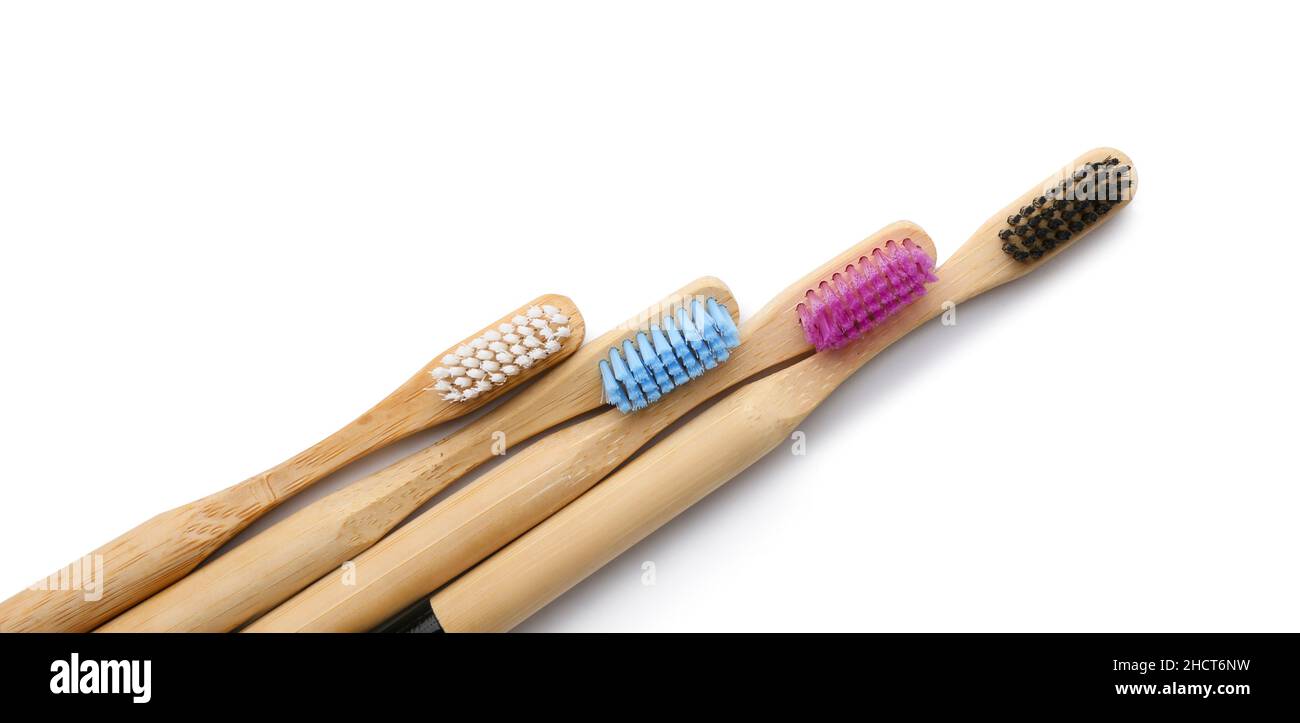 Bamboo toothbrushes on white background Stock Photo - Alamy