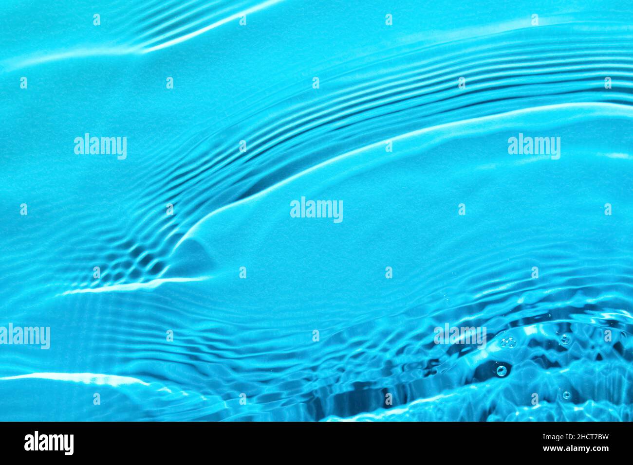 Surface of clean water with ripples Stock Photo - Alamy