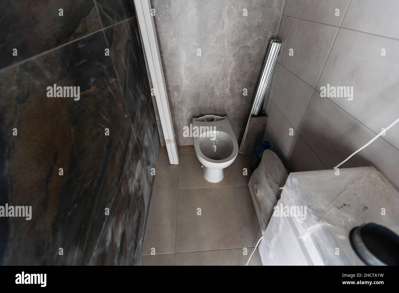 bathroom renovation removing tiles in apartment bathroom Stock Photo Alamy