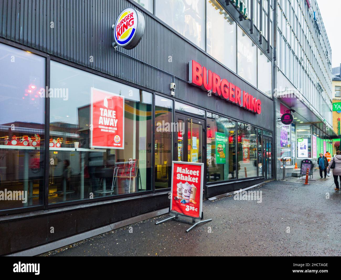 Turku, Finland - December 14, 2021: Vertical View of Burger King Storefront Restaurant in DOwntown Turku. Stock Photo