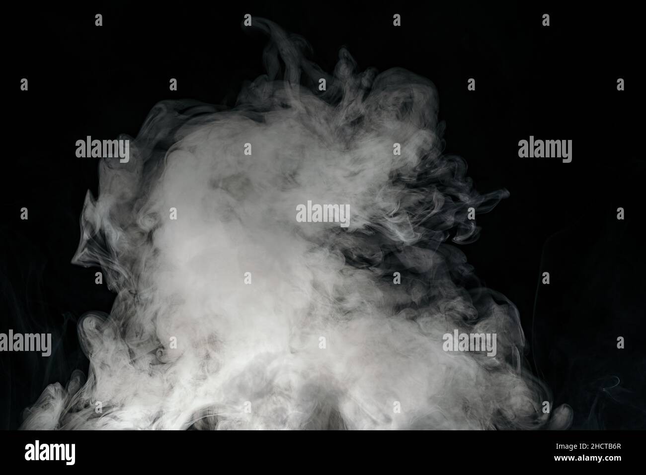 cloud of smoke isolated on black background Stock Photo - Alamy