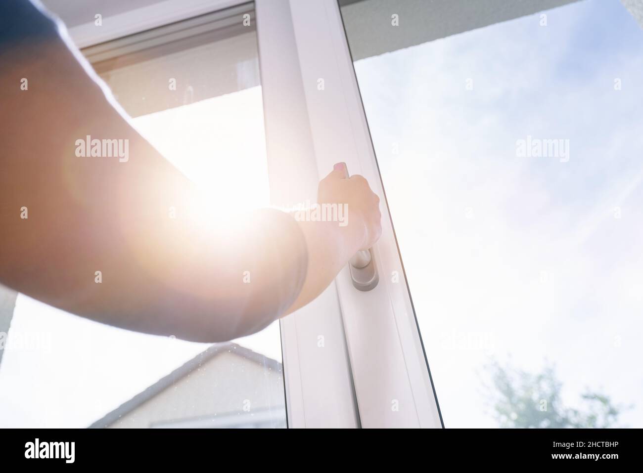 opened white plastic pvc window with sunlight Stock Photo Alamy