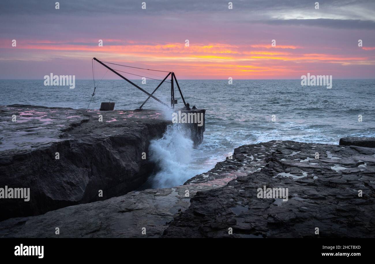 Portland Bill, Portland, Dorset, UK. 1st Jan, 2022. Colourful dawn clouds on the first day of 2022 . Picture by Dan Tucker/Alamy Live News Stock Photo