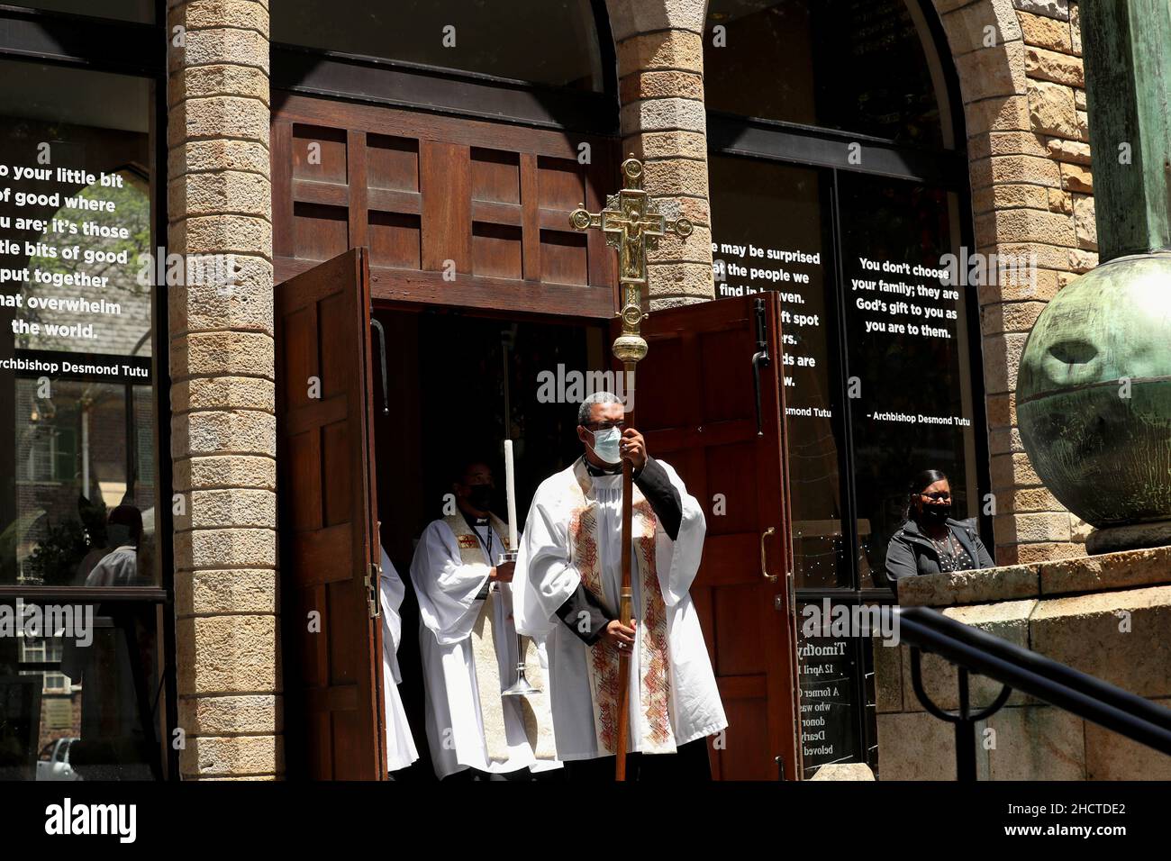 Members of the clergy exit St George's Cathedral after the funeral service of Archbishop Desmond Tutu in Cape Town, South Africa, January 1, 2022. REUTERS/Mike Hutchings Stock Photo