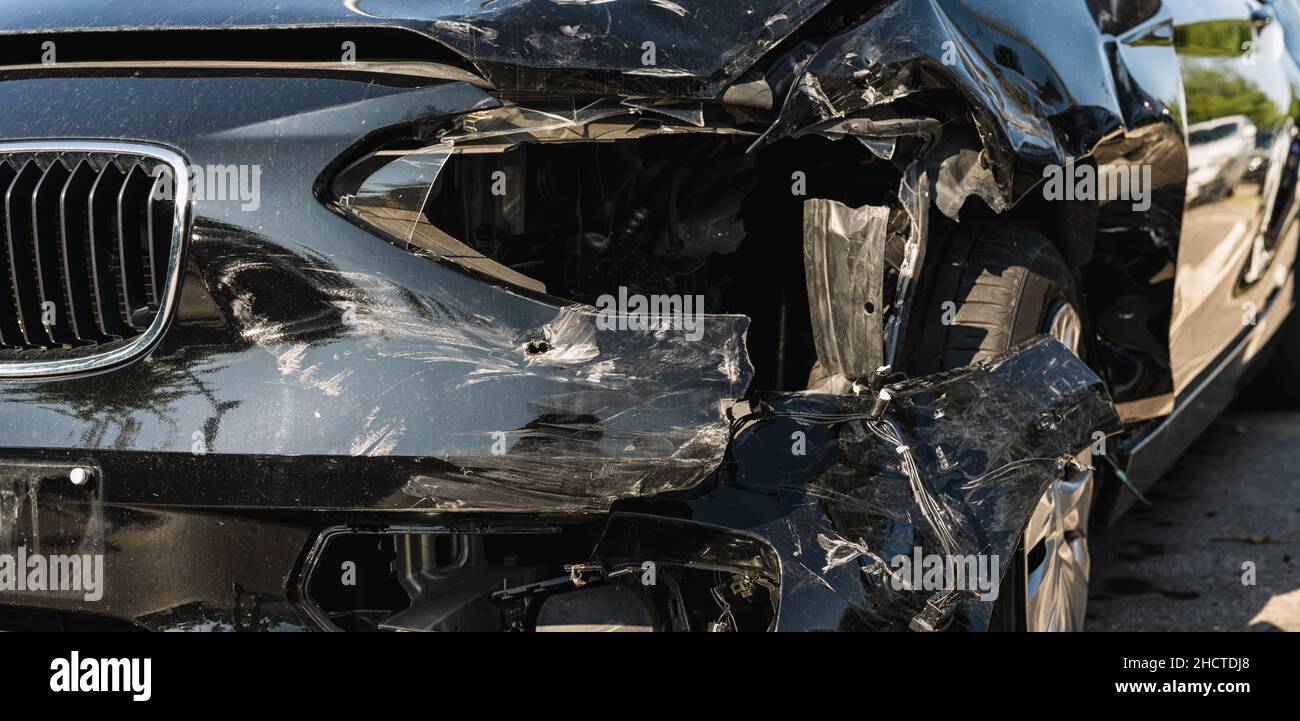 Car crash or accident. Front fender and light damage and scratchs on