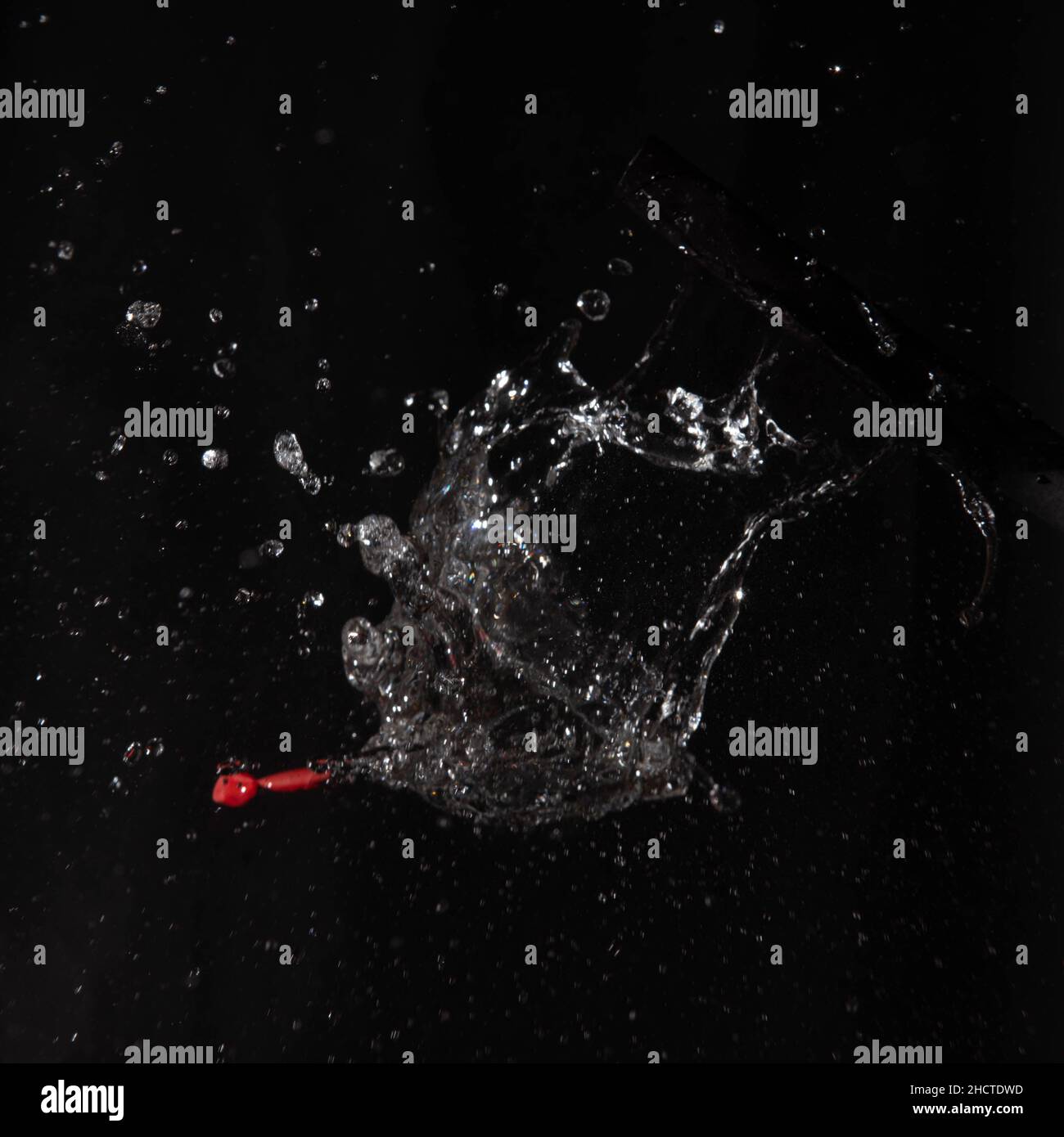 water balloon burst red Stock Photo - Alamy