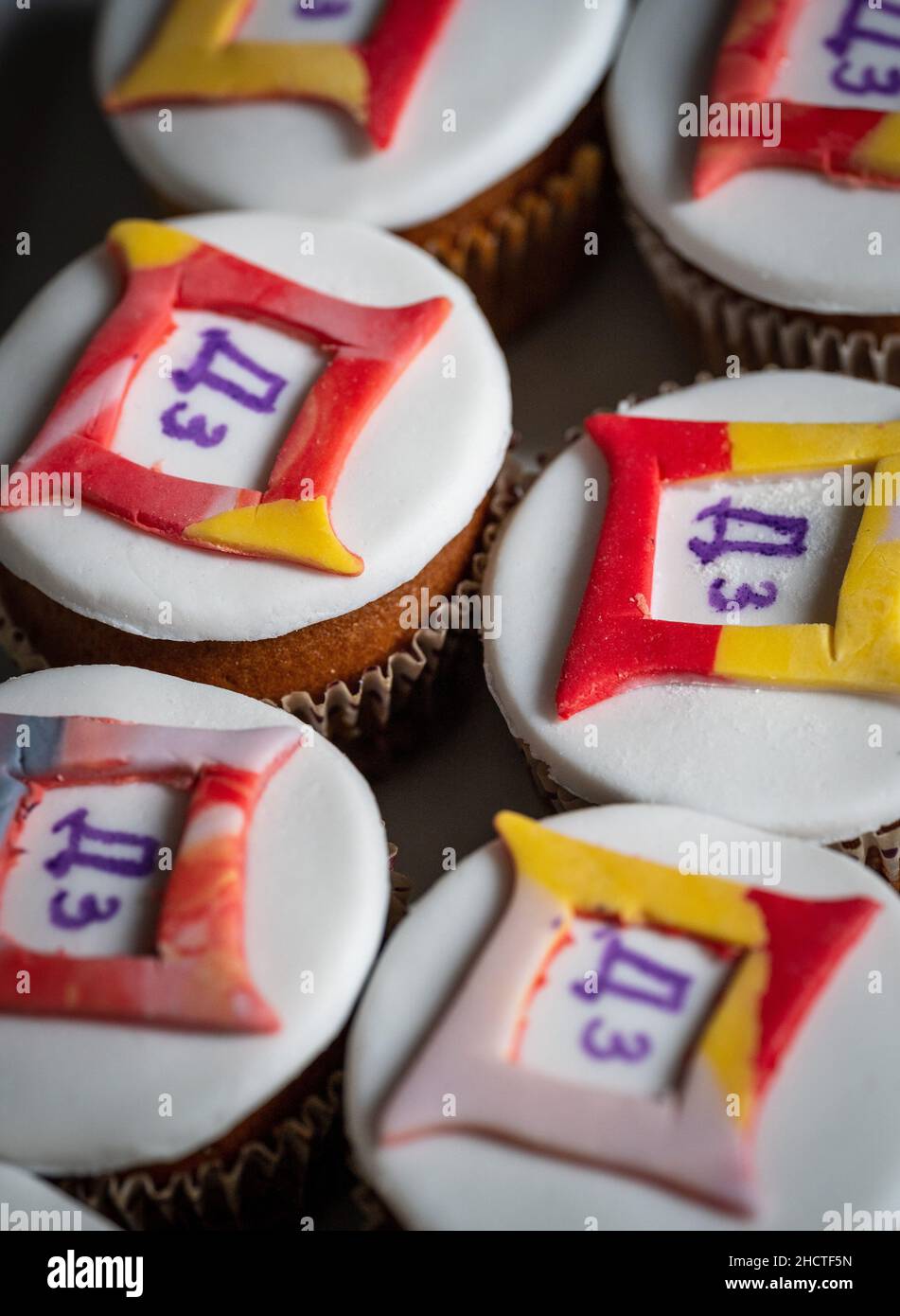 Vertical shot of little cupcakes with sweet Vitamin D3 toppings Stock Photo