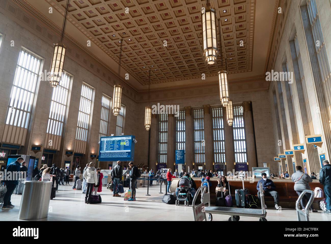 30th Street Station in Philadelphia, constructed between 1929 and 1934 by the Pennsylvania Railroad, has an imposing Art Deco waiting room. Stock Photo