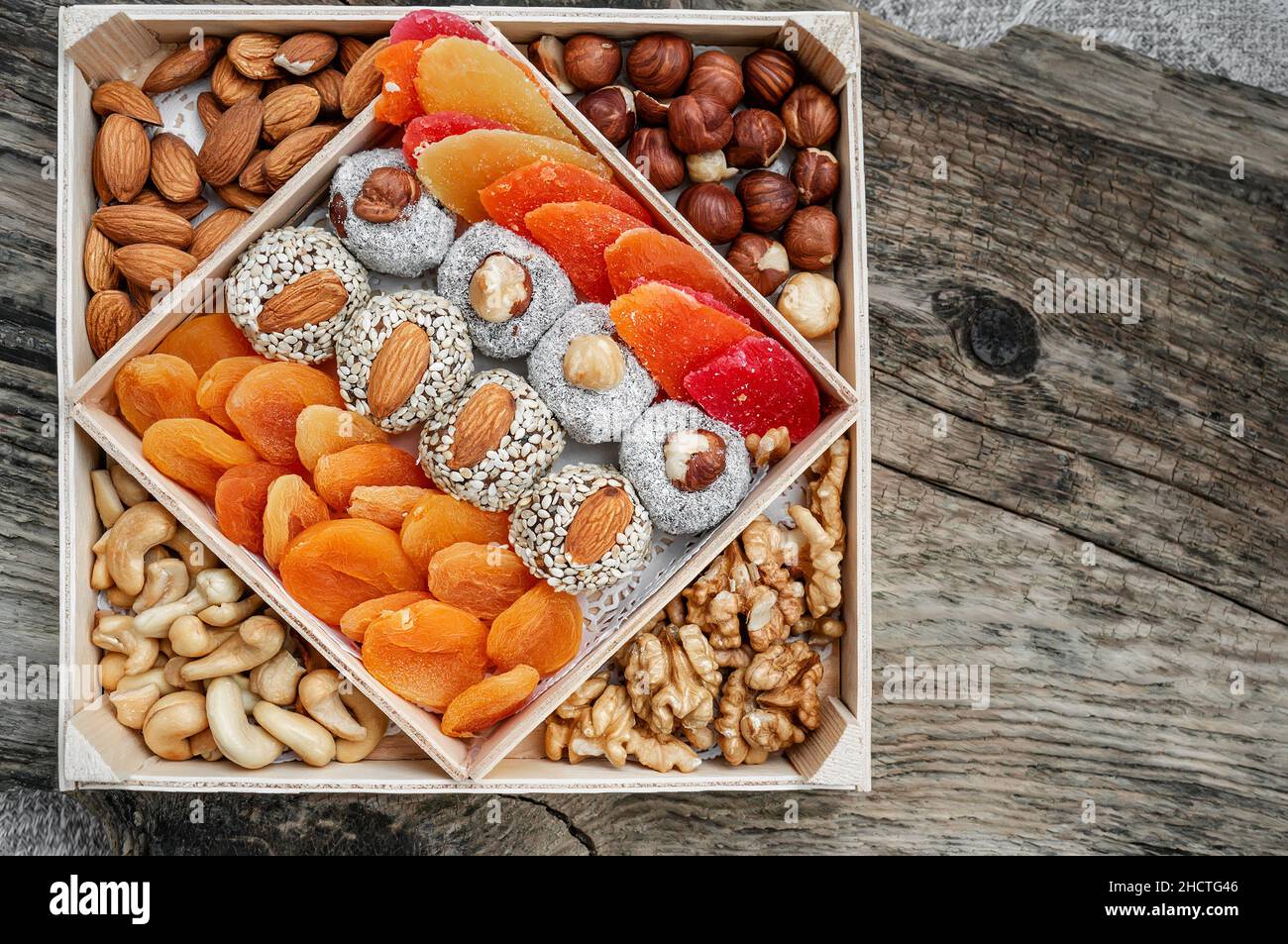 Assorted dried fruits, candied fruits and nuts. Dried fruits are in