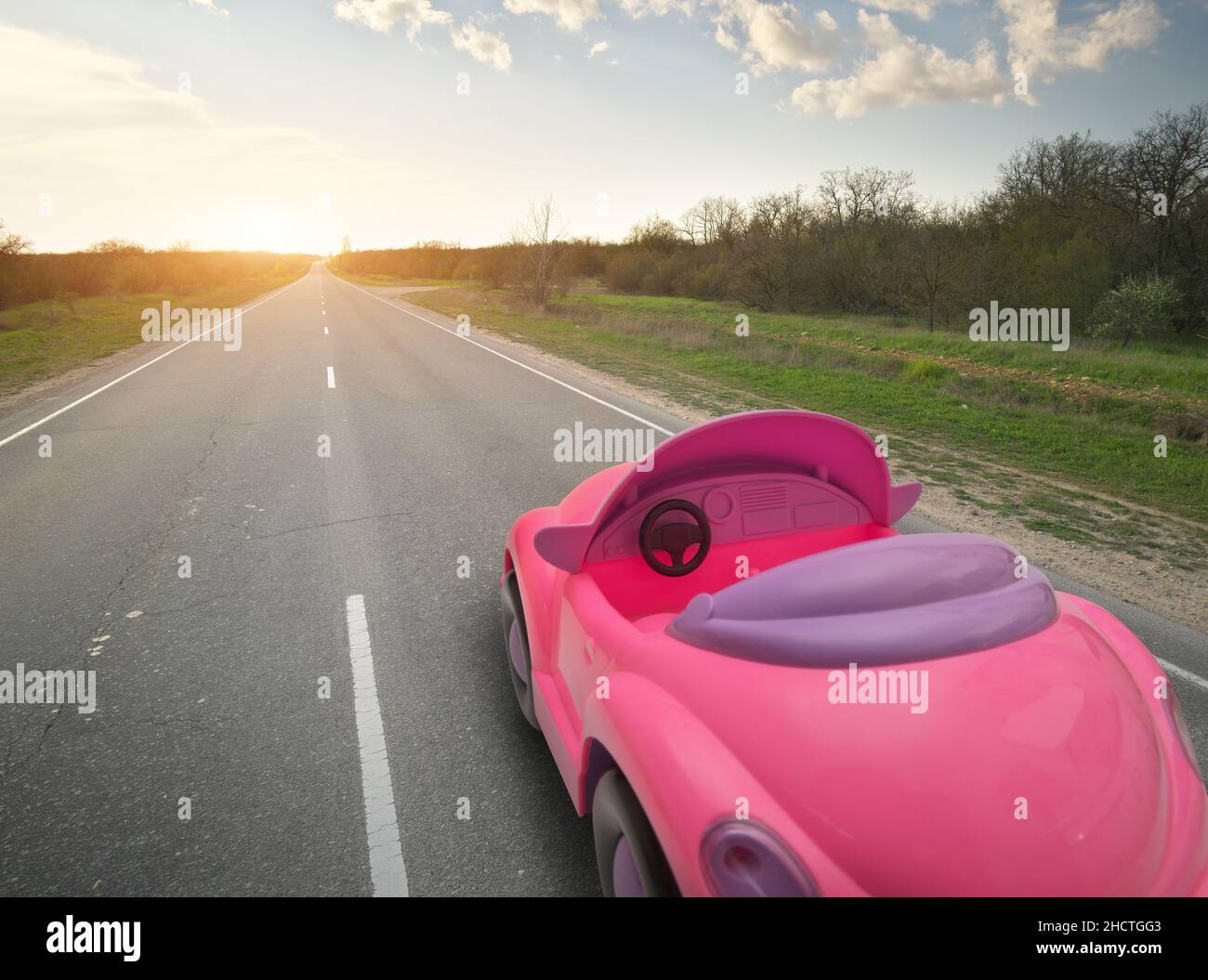 Toy car on real road. Conceptual idea design Stock Photo Alamy