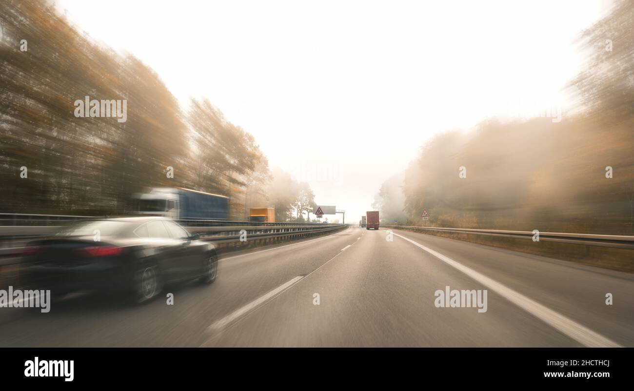 motorway, with limited traffic, on an autumn day Stock Photo