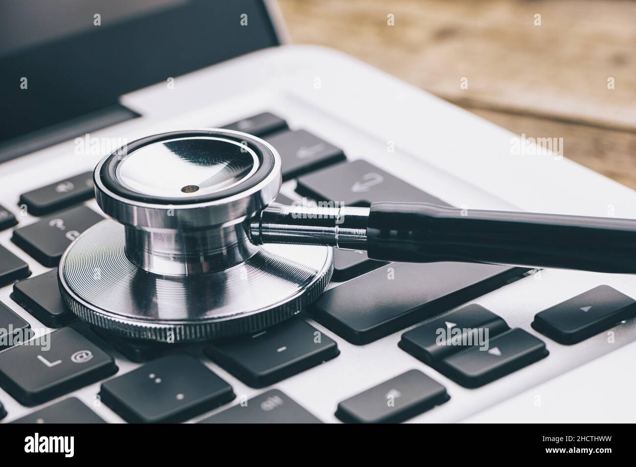 Stethoscope on a notebook - Virus alert concept image Stock Photo