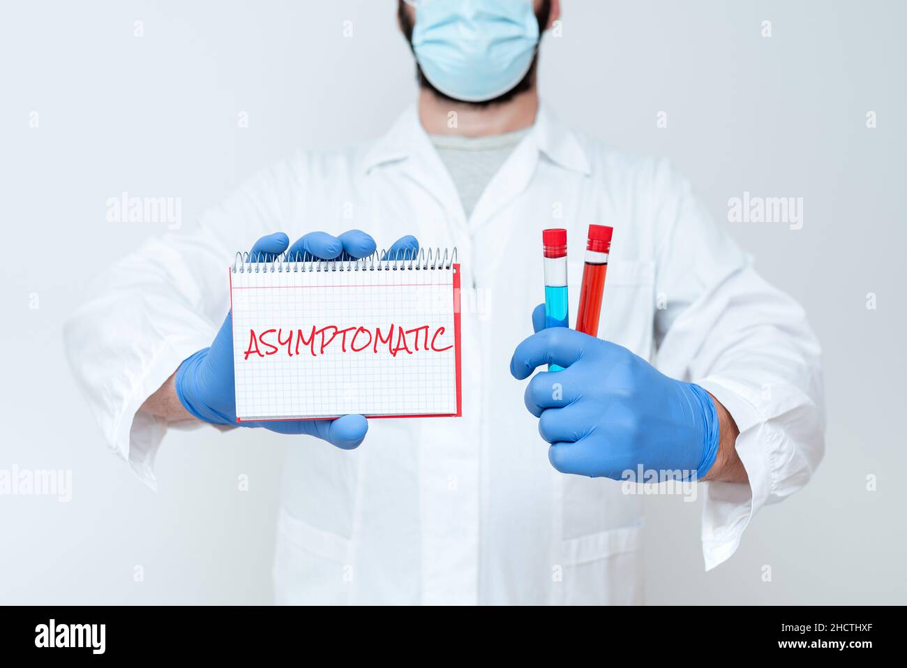 Hand writing sign Asymptomatic. Business overview a condition or a person producing or showing no symptoms Scientist Presenting New Research, Chemist Stock Photo