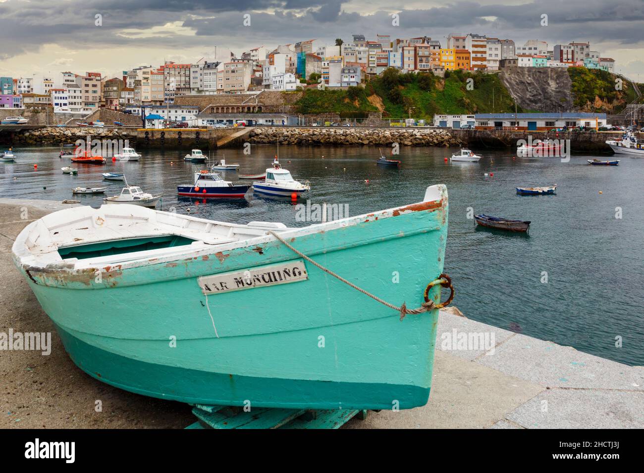 Malpica, A Coruna Province, Galicia, Spain.  View over fishing harbour to town. Stock Photo