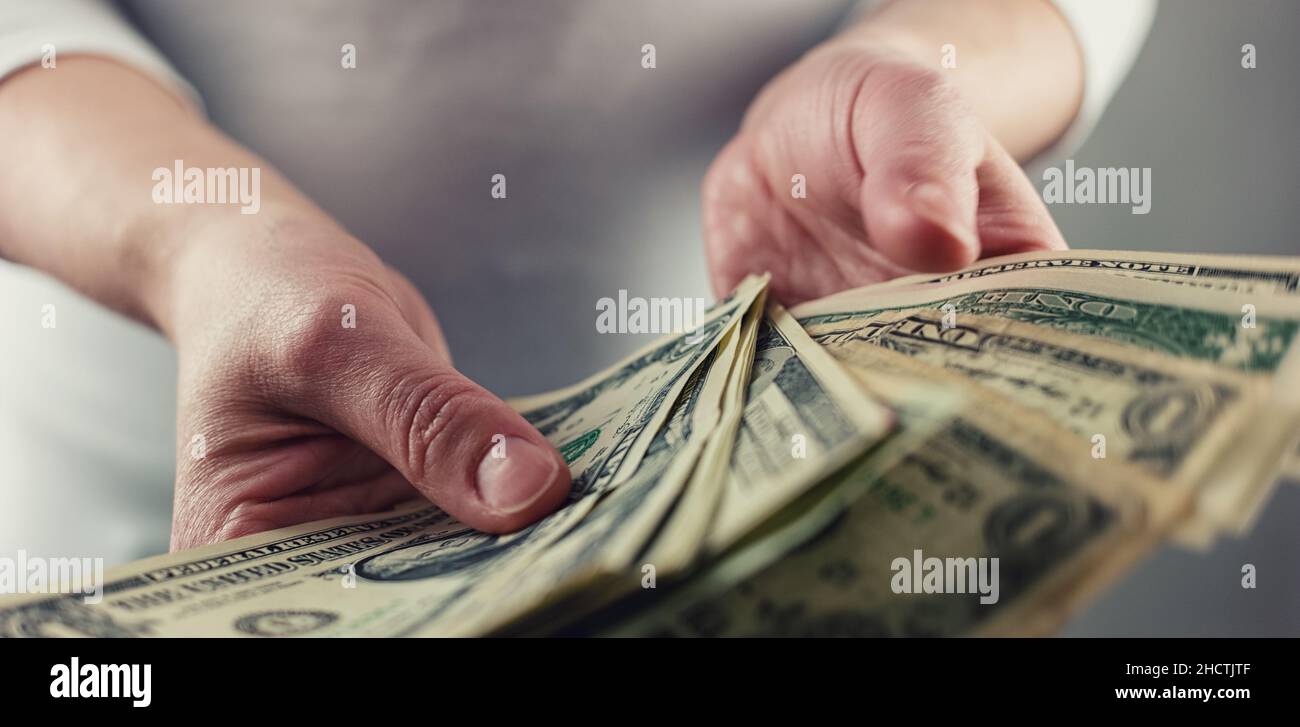 Displaying a Spread of Cash Stock Photo - Alamy
