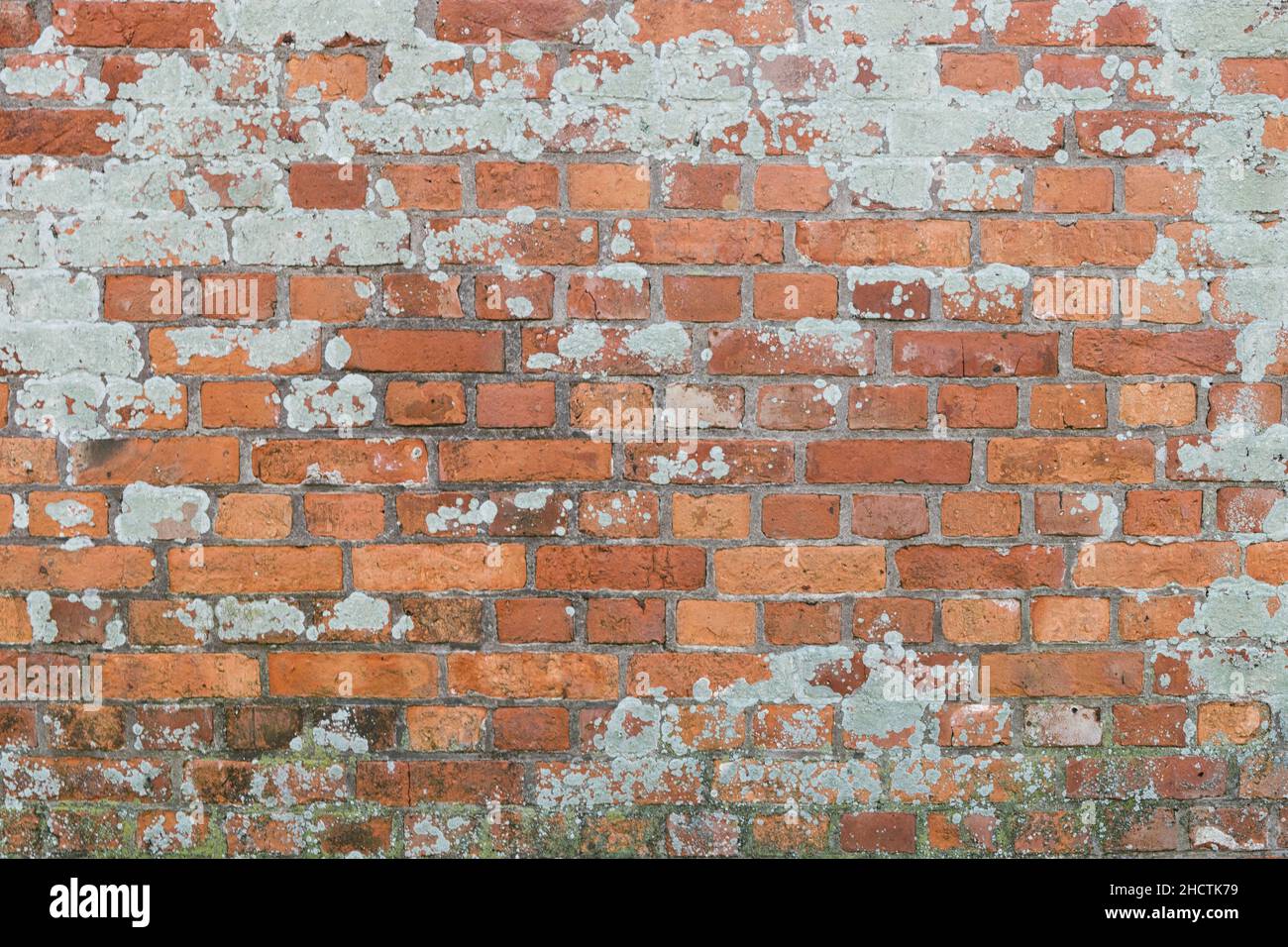 Old weathered red Brick Wall Background Stock Photo