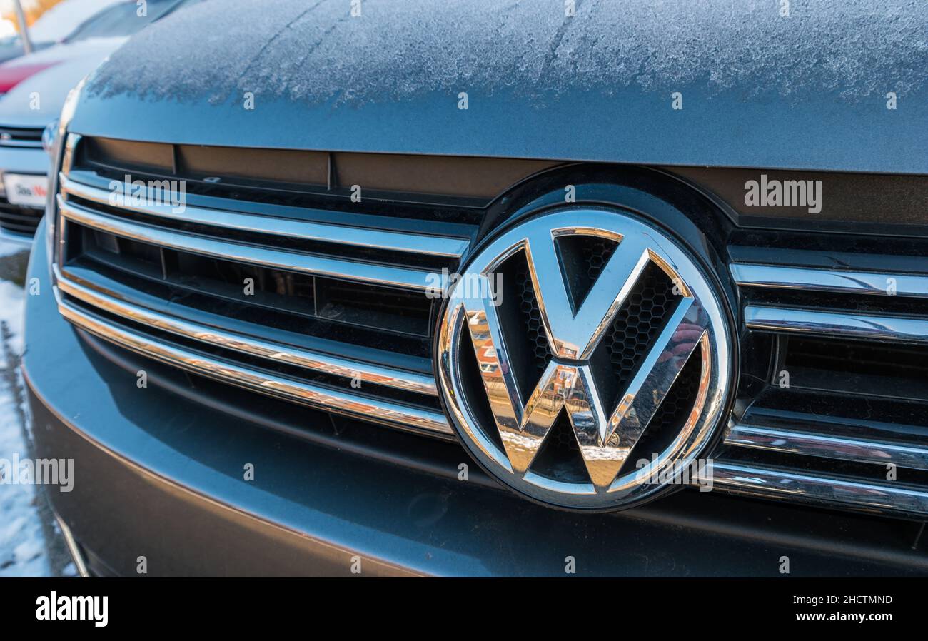 Sign of a Volkswagen logo on a car. Volkswagen is a German car manufacturer headquartered in Wolfsburg, Lower Saxony, Germany Stock Photo