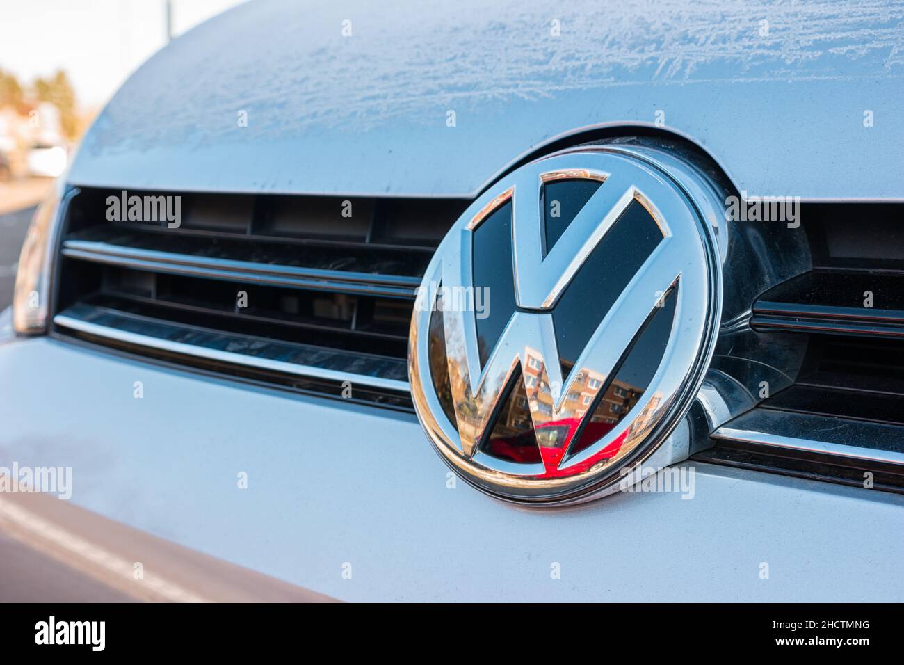 Sign of a Volkswagen logo on a car. Volkswagen is a company of the Volkswagen Group. Stock Photo