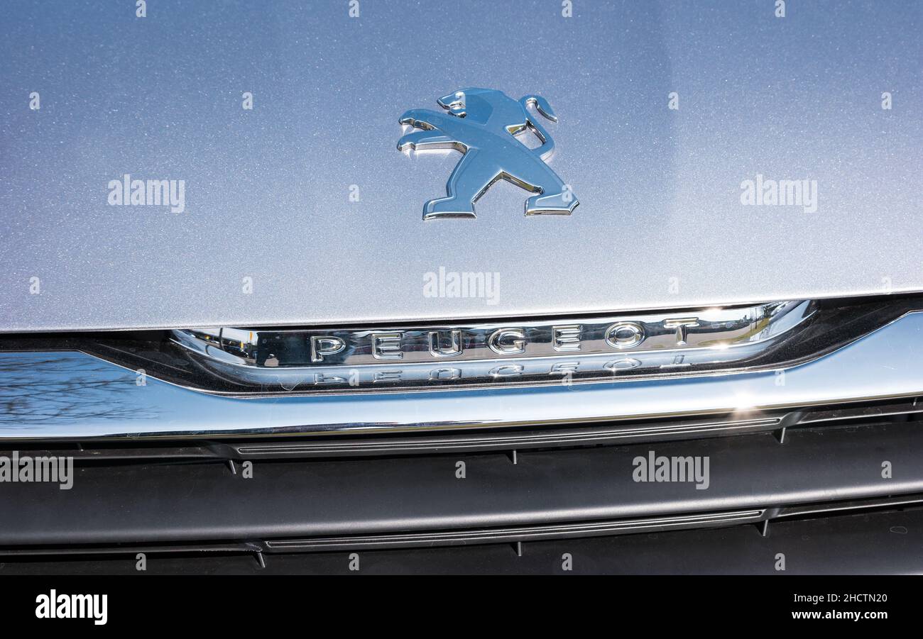Peugeot logo on a car grill. Peugeot is a French cars brand, part of PSA Peugeot Citroen Stock
