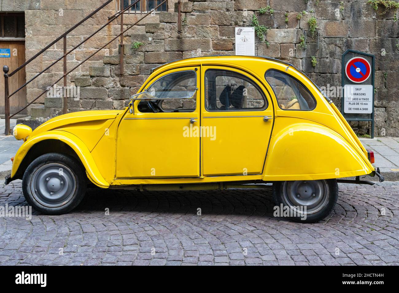SAINT-MALO, FRANCE - SEPTEMBER 4. 2019: This is an old yellow Citroen Citroen 2 CB, the legend of the French car industry. Stock Photo
