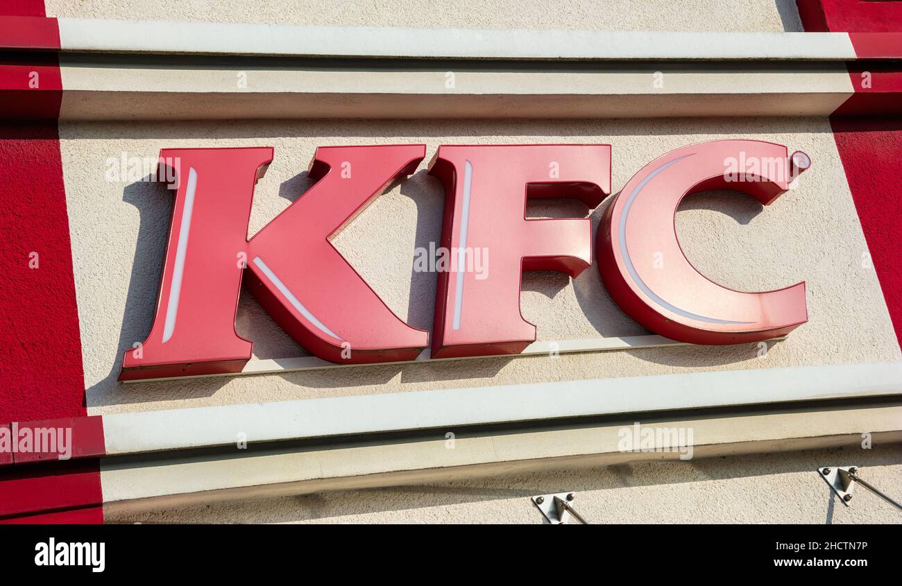 Kentucky Fried Chicken Restaurant Sign. It is a fast food restaurant chain headquartered in United States specialized in chicken products. Stock Photo