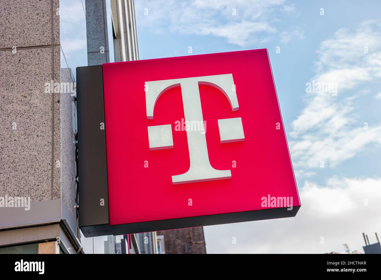 Logo of Deutsche Telekom on a shop. There are around 750 so called 'T-Punkt' shops which sell products and services of Deutsche Telekom. Stock Photo