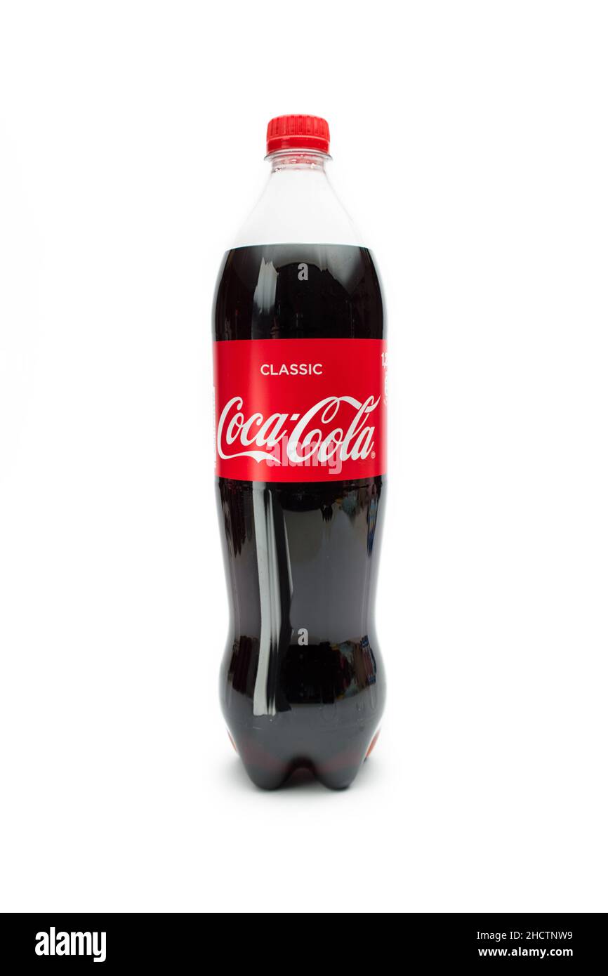 plastic bottle Of Coca-Cola isolated on white background. Coca-Cola is a carbonated non-alcoholic beverage sold all over the world. Stock Photo