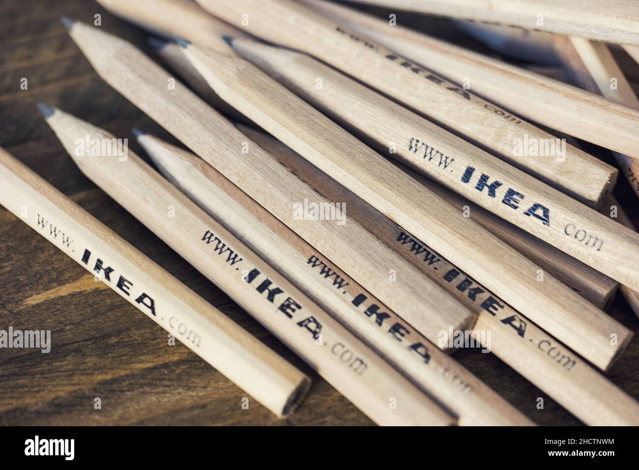 IKEA pencils placed ona wooden table . IKEA Founded in Sweden in 1943, Ikea  is the world's largest furniture retailer Stock Photo - Alamy