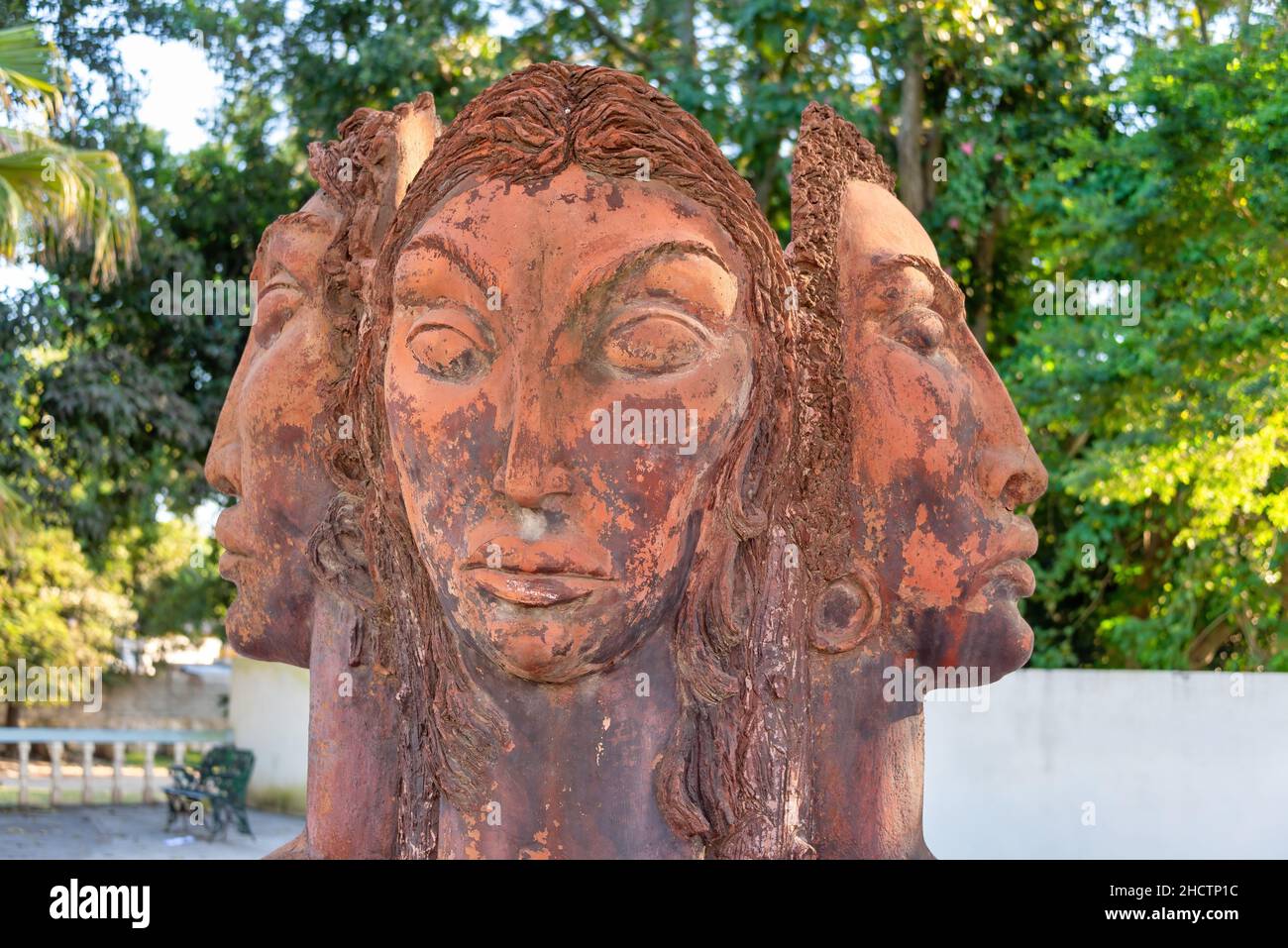 Cuban culture art sculpture with aboriginal faces seen on a small parquet. Jan. 1, 2021 Stock Photo