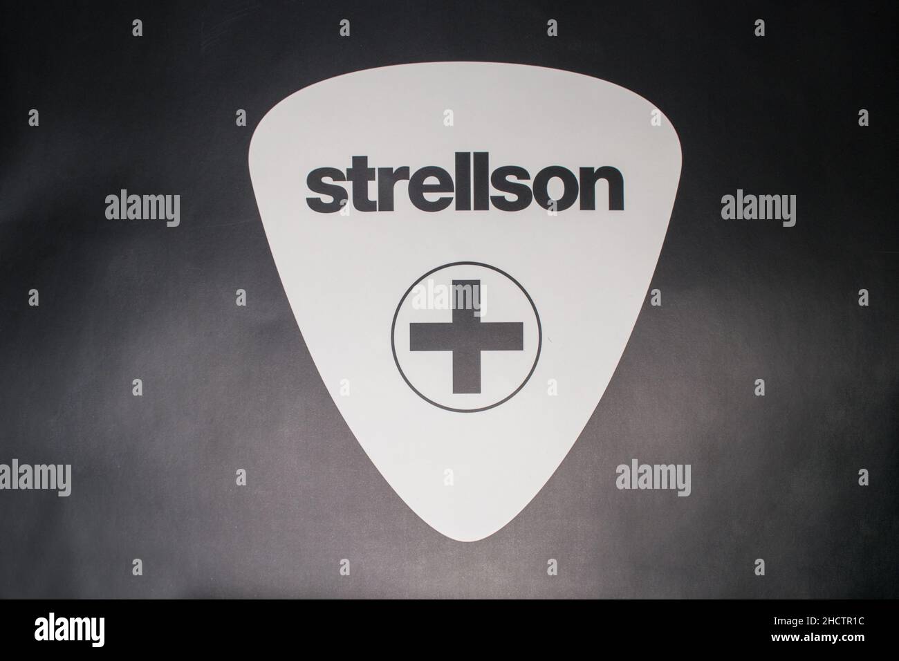 White Logo of 'Strellson'. Strellson was created in 1984 by the Strellson AG. The product range mainly includes suits, trousers, shirts, sweaters, bag Stock Photo