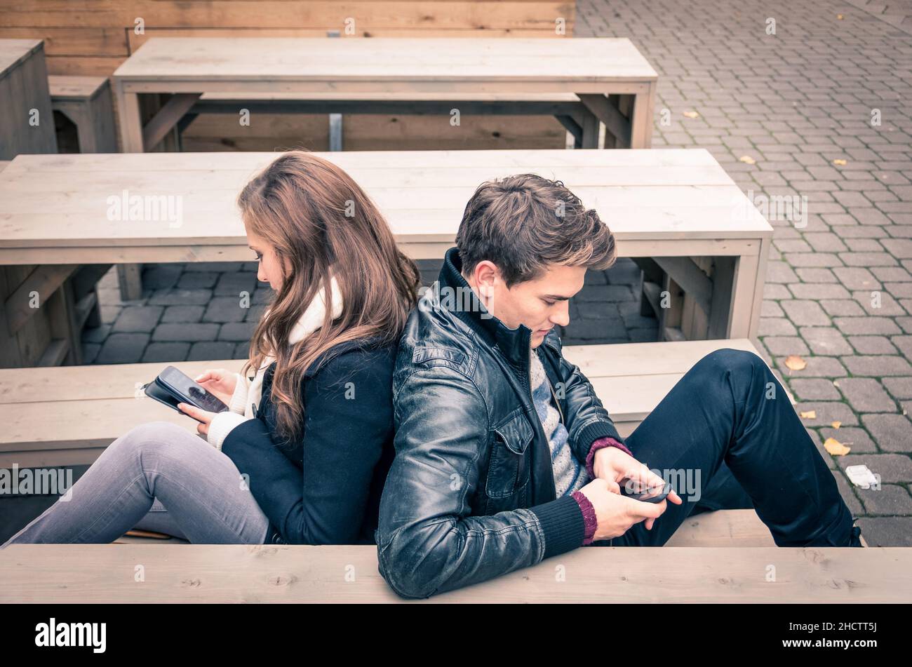 Couple in a modern common phase of mutual disinterest Stock Photo