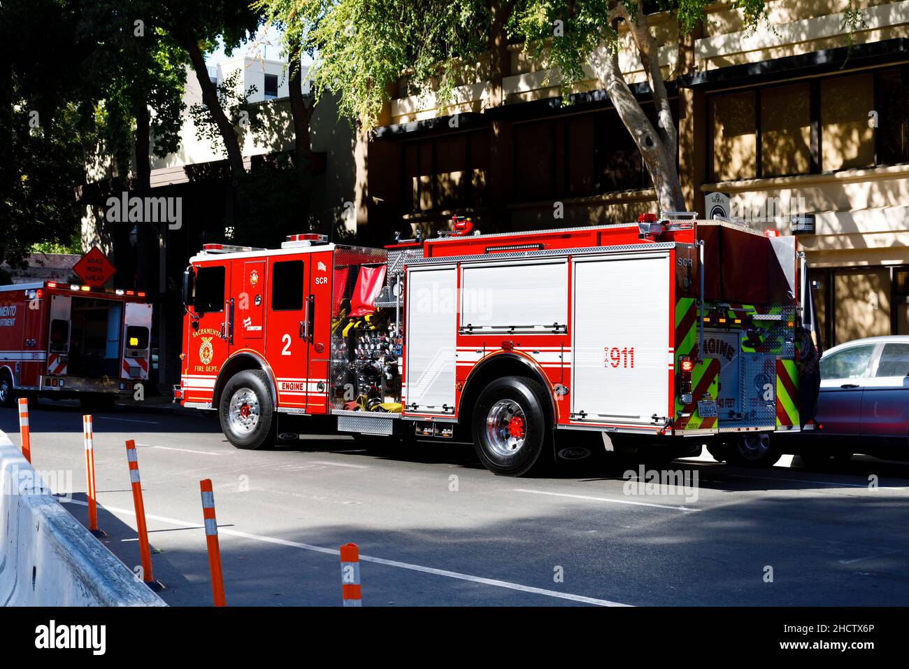 Pierce Fire engine pumper appliance #2 from the Sacramento Fire Department on call at 1st Street, Sacramento, California, United States of America Stock Photo