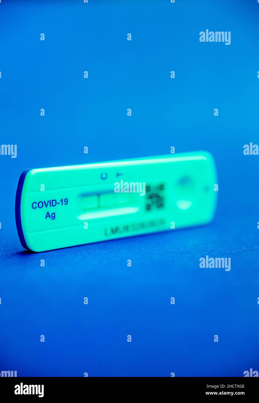 Quick testing for Covid-19 / SARS-CoV-2 infection concept: One rapid antigen test with blurred background . Stock Photo