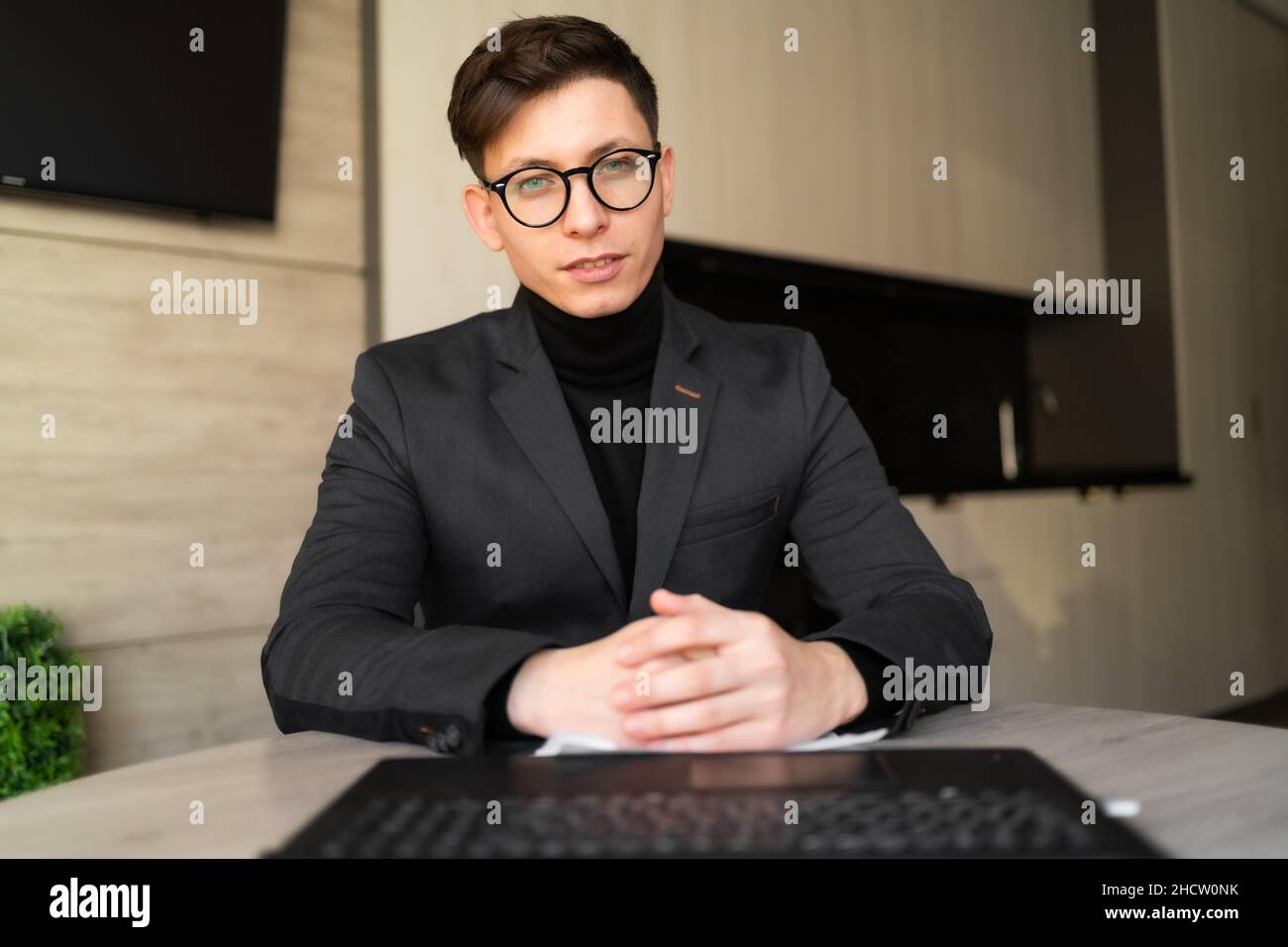 male coach teacher webinar talking looking camera giving online class a lecture, webcam view, conference video chat call, entrepreneur or businessman Stock Photo