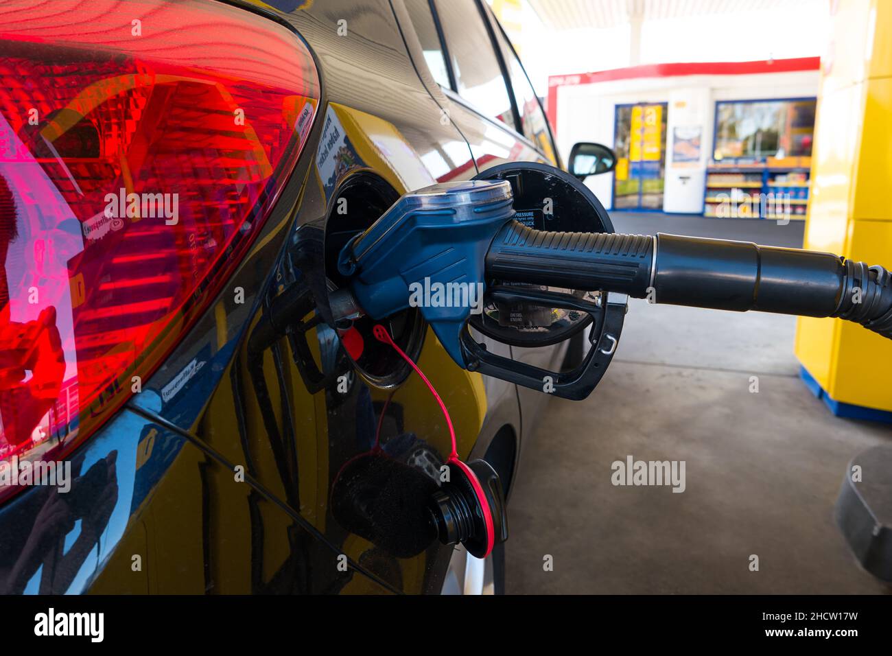 fuel a car with diesel gas at the refuel station Stock Photo