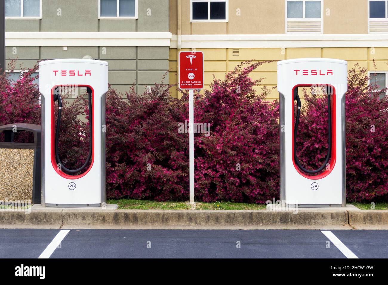 Tesla supercharger stations in a parking area Stock Photo