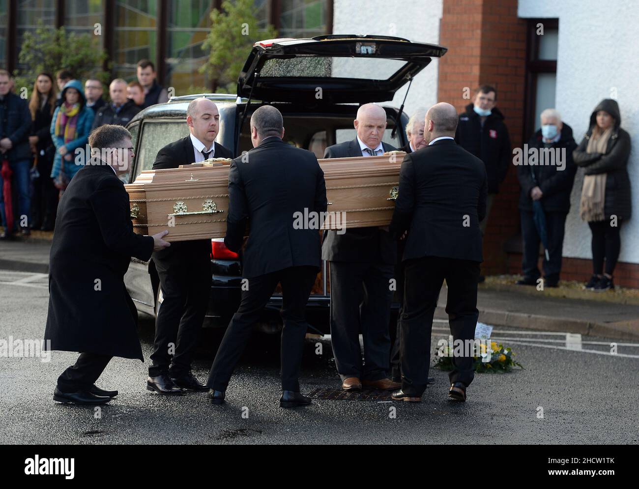 The coffin of Peter (Petey) McNamee being carried in to the Church of