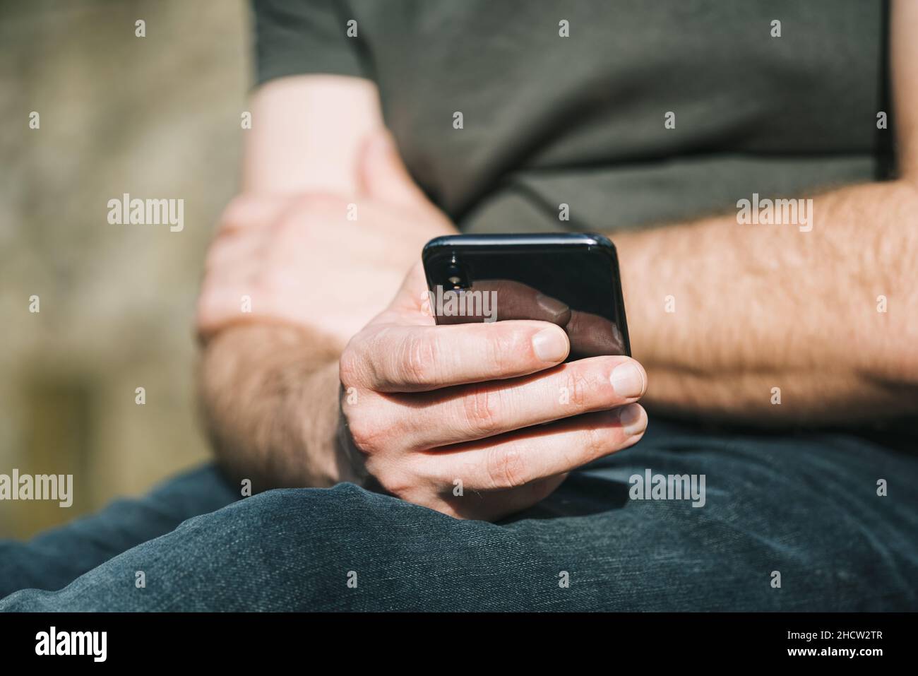 Man Using Mobile Device Male gaming mobile hi-res stock photography and images - Alamy