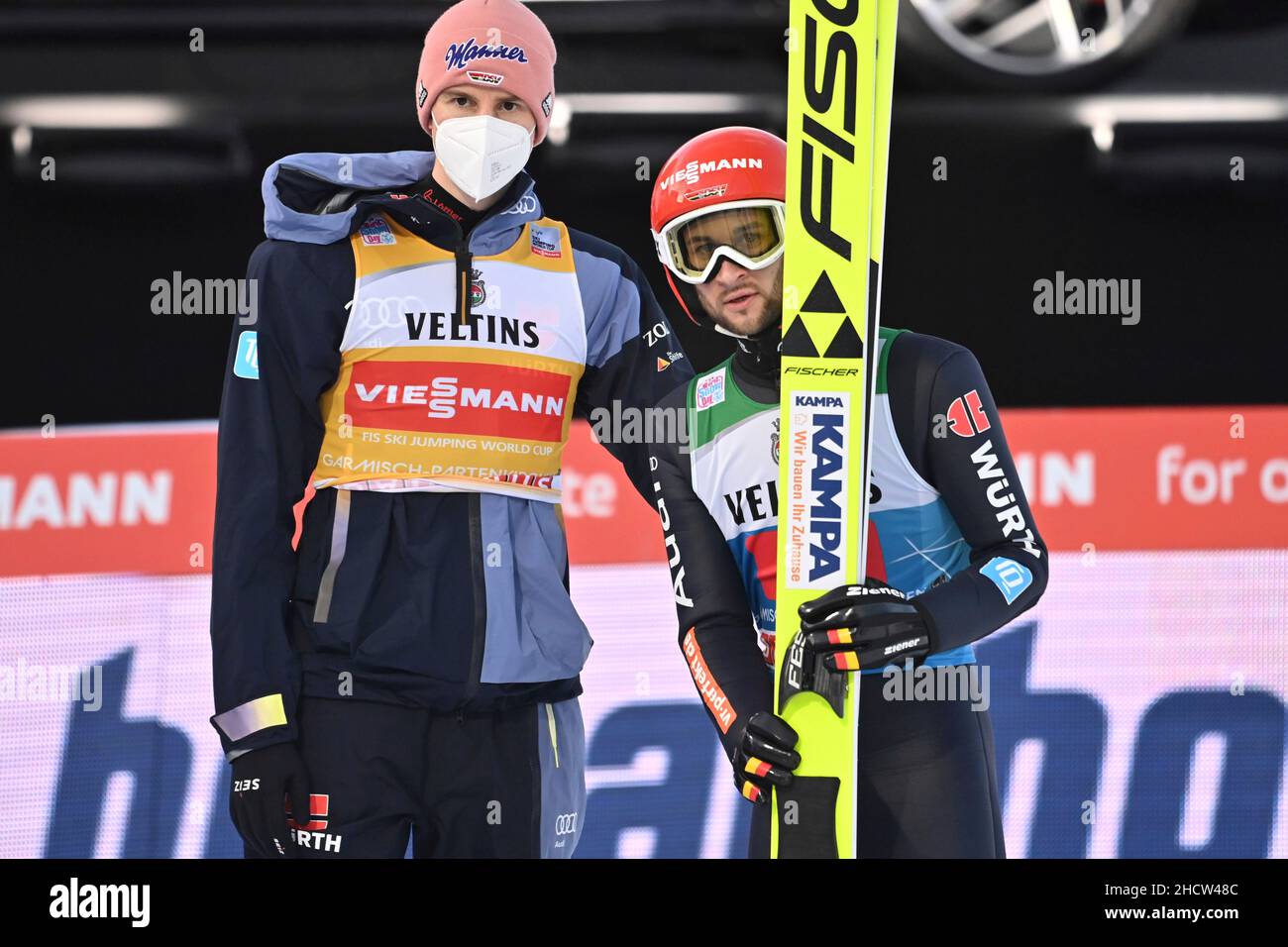 Markus EISENBICHLER (right, GER) Karl GEIGER (GER) in the finish area. Action, ski jumping, 70th International Four Hills Tournament 2021/22, New Year's jump in Garmisch Partenkirchen, Olympic hill on January 1st, 2022 Stock Photo