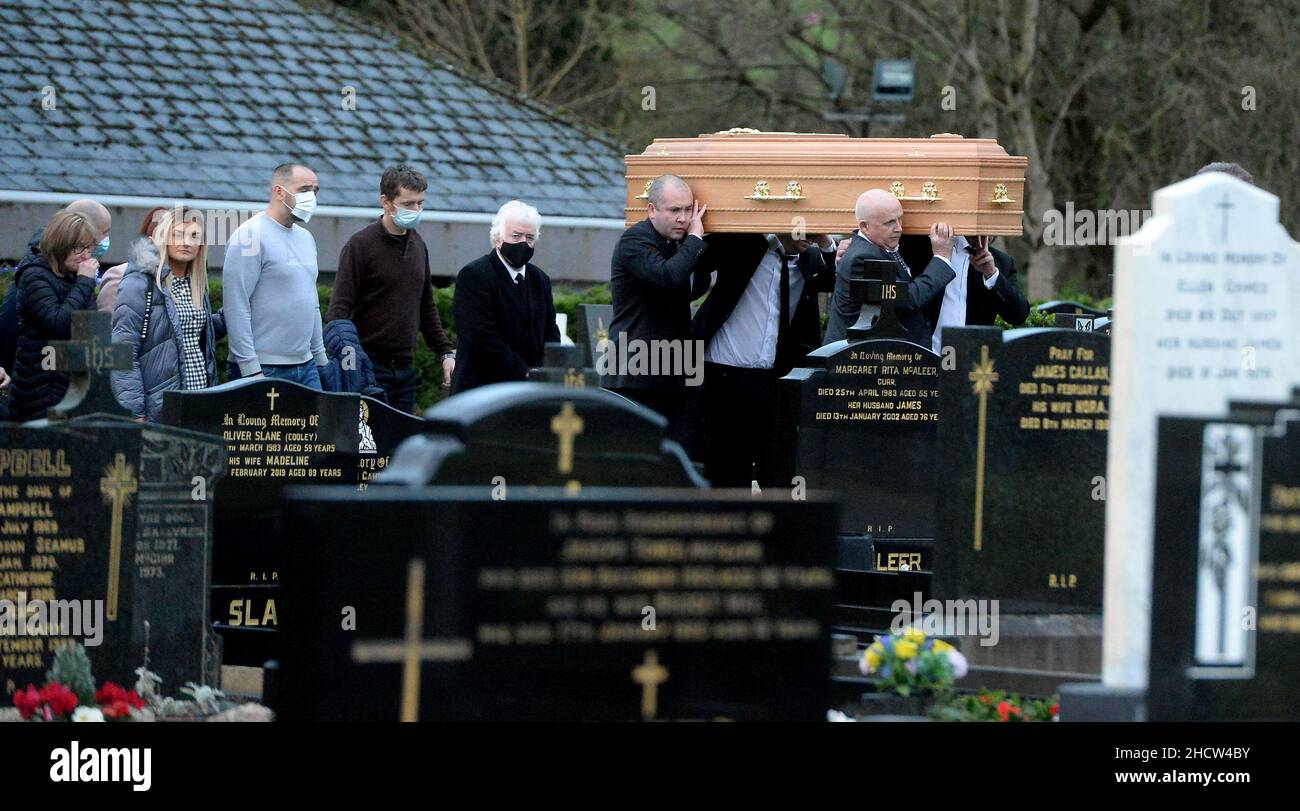 The coffin of Peter (Petey) McNamee being carried in the graveyard the