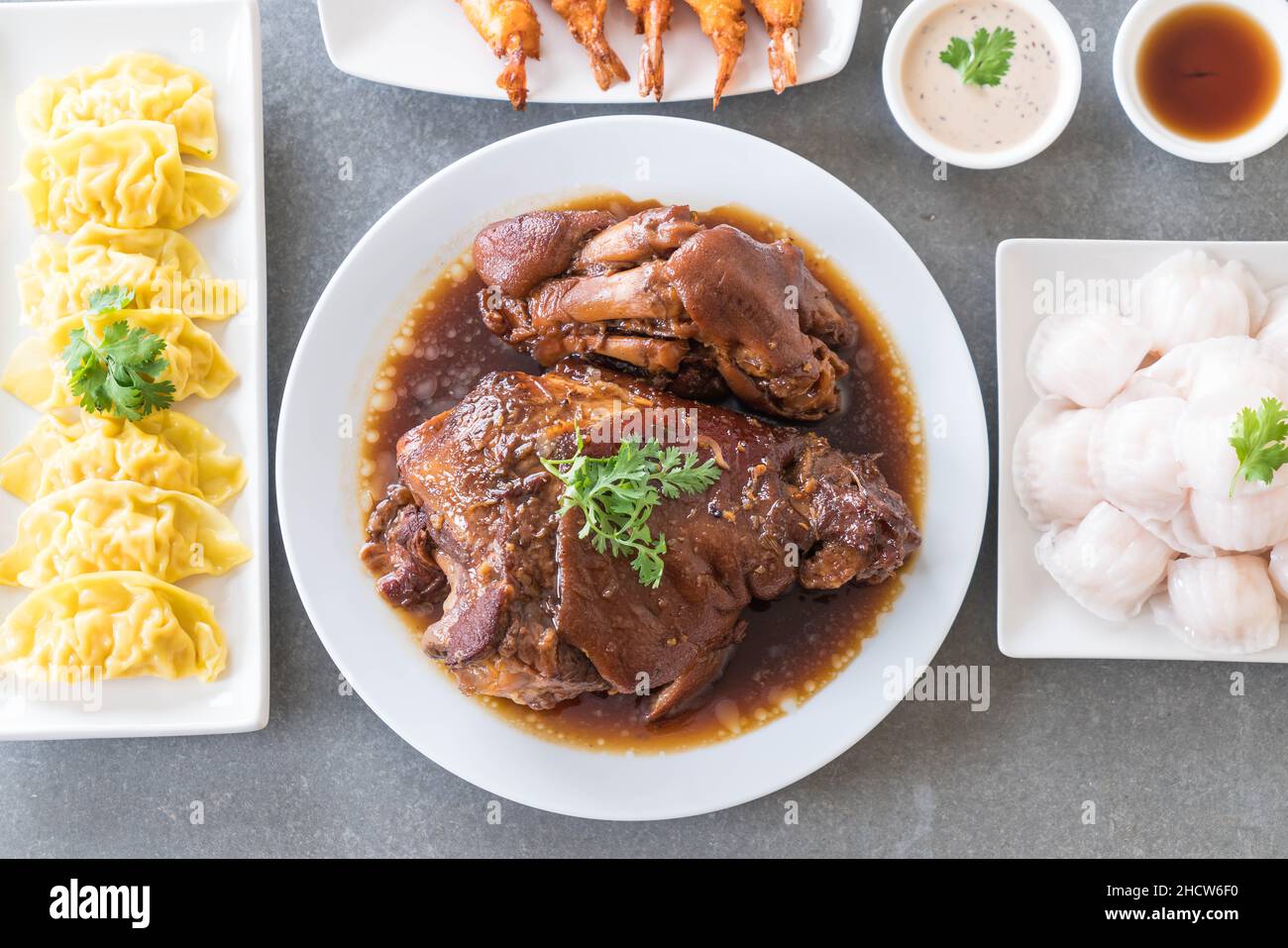 Stewed pork leg in gravy soup on dining table Stock Photo Alamy