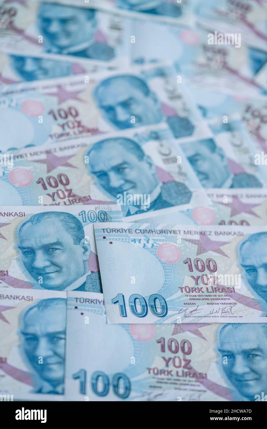 Turkish Lira, Background with hundred Turkish Lira banknotes that Republic of Turkey currency with selective focus and noise effects Stock Photo