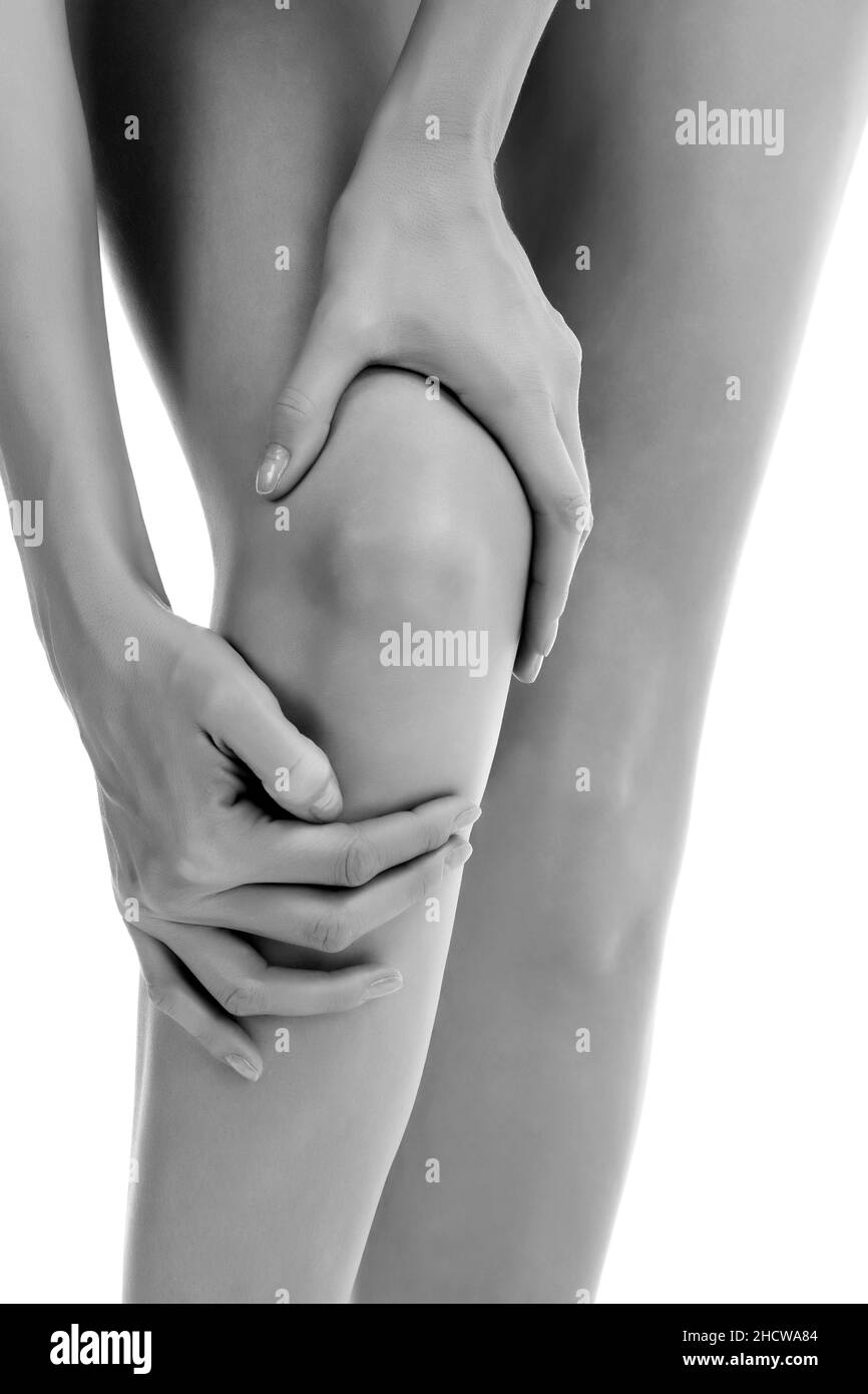 woman with leg injury, isolated on white background, copyspace Stock Photo