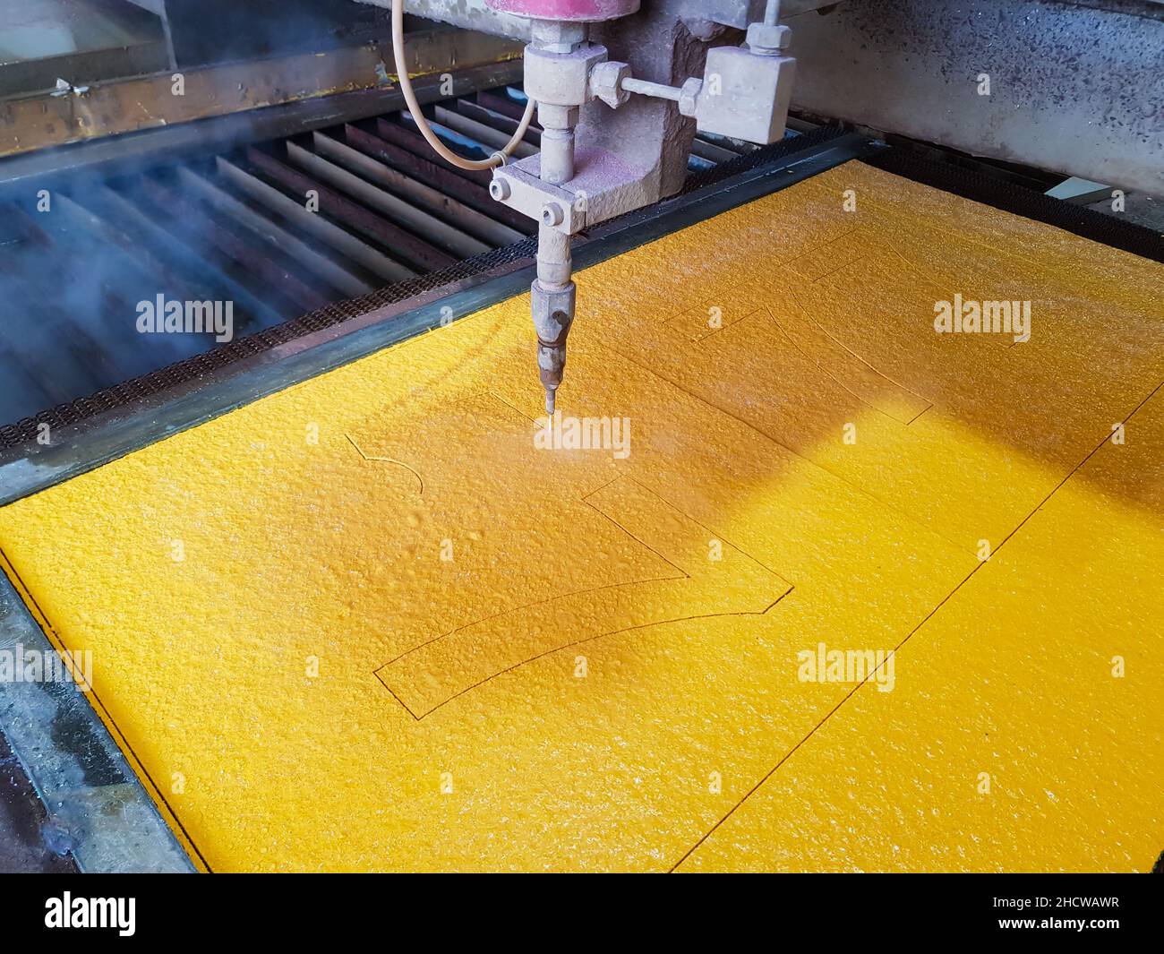 CNC water jet cutting machine is a modern industrial technology for