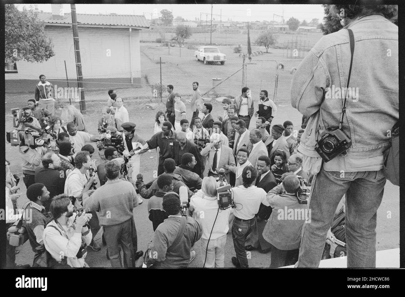 On 15 October 1989 Ahmed Kathrada, along with Jeff Masemola, Raymond Mhlaba, Billy Nair, Wilton Mkwayi, Andrew Mlangeni, Elias Motsoaledi, Oscar Mpetha, and Walter Sisulu were released from Johannesburg prison.    The return to Bettina and Walter Sisulu's  house in Soweto, Desmond Tutu attended. *** Local Caption *** Ahmed Mohammed Kathrada (or 'Kathy' as he is popularly known) was born in 1929 to Indian immigrants in a rural town in South Africa Stock Photo