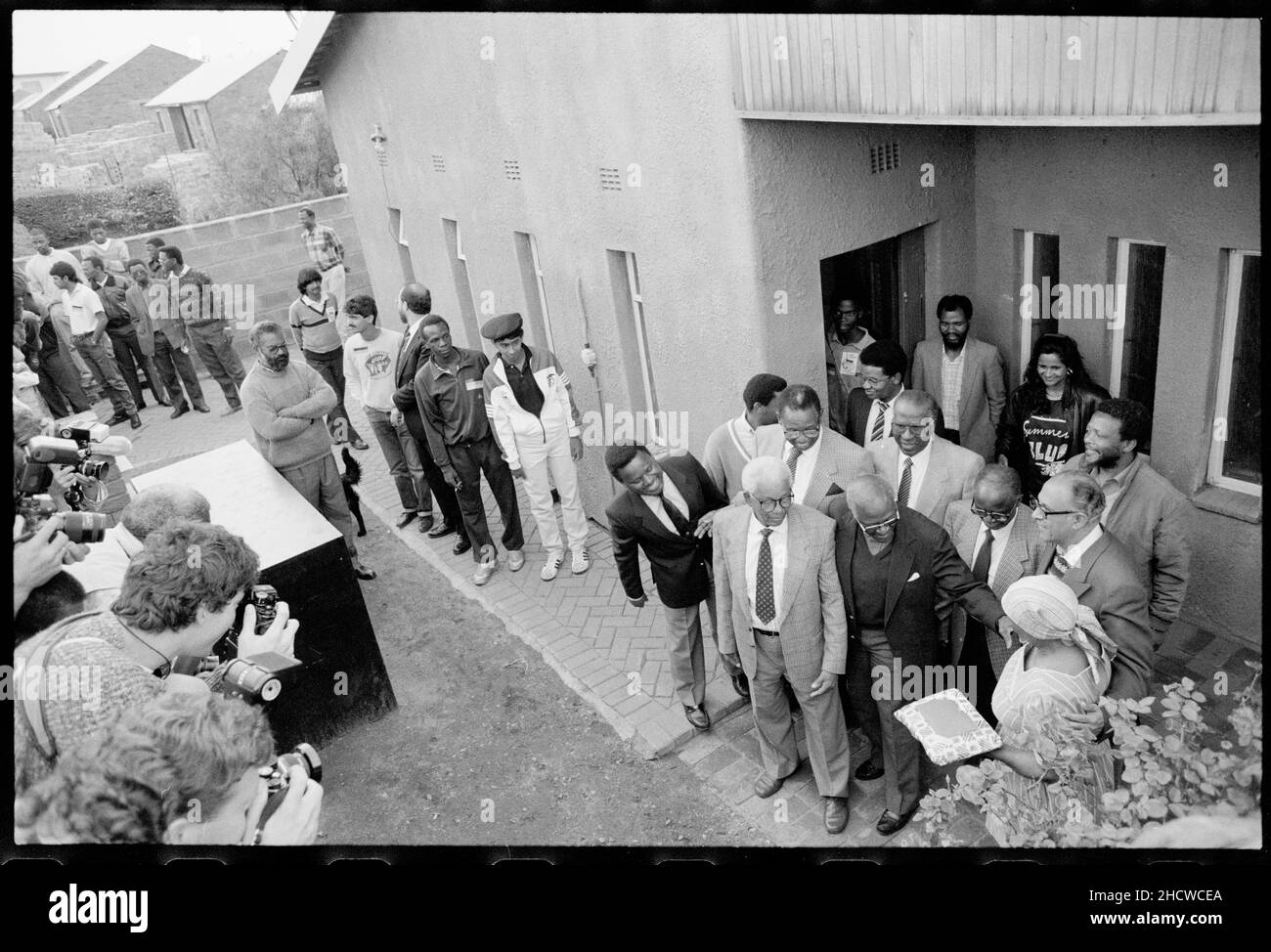 On 15 October 1989 Ahmed Kathrada, along with Jeff Masemola, Raymond Mhlaba, Billy Nair, Wilton Mkwayi, Andrew Mlangeni, Elias Motsoaledi, Oscar Mpetha, and Walter Sisulu were released from Johannesburg prison.    The return to Bettina and Walter Sisulu's  house in Soweto, Desmond Tutu attended. *** Local Caption *** Ahmed Mohammed Kathrada (or 'Kathy' as he is popularly known) was born in 1929 to Indian immigrants in a rural town in South Africa Stock Photo