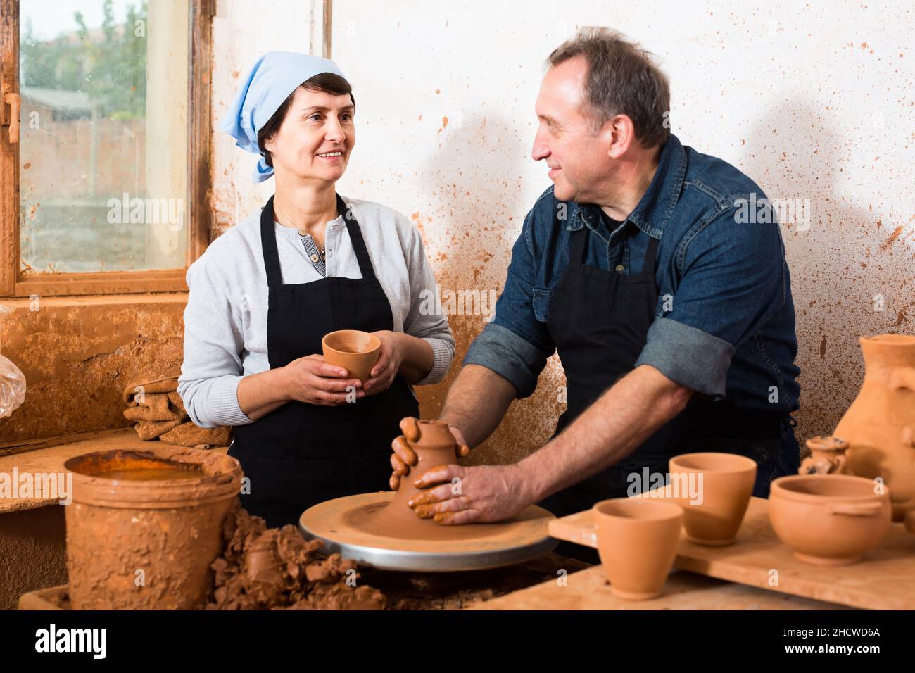 Elderly couple at pottery Stock Photo Alamy