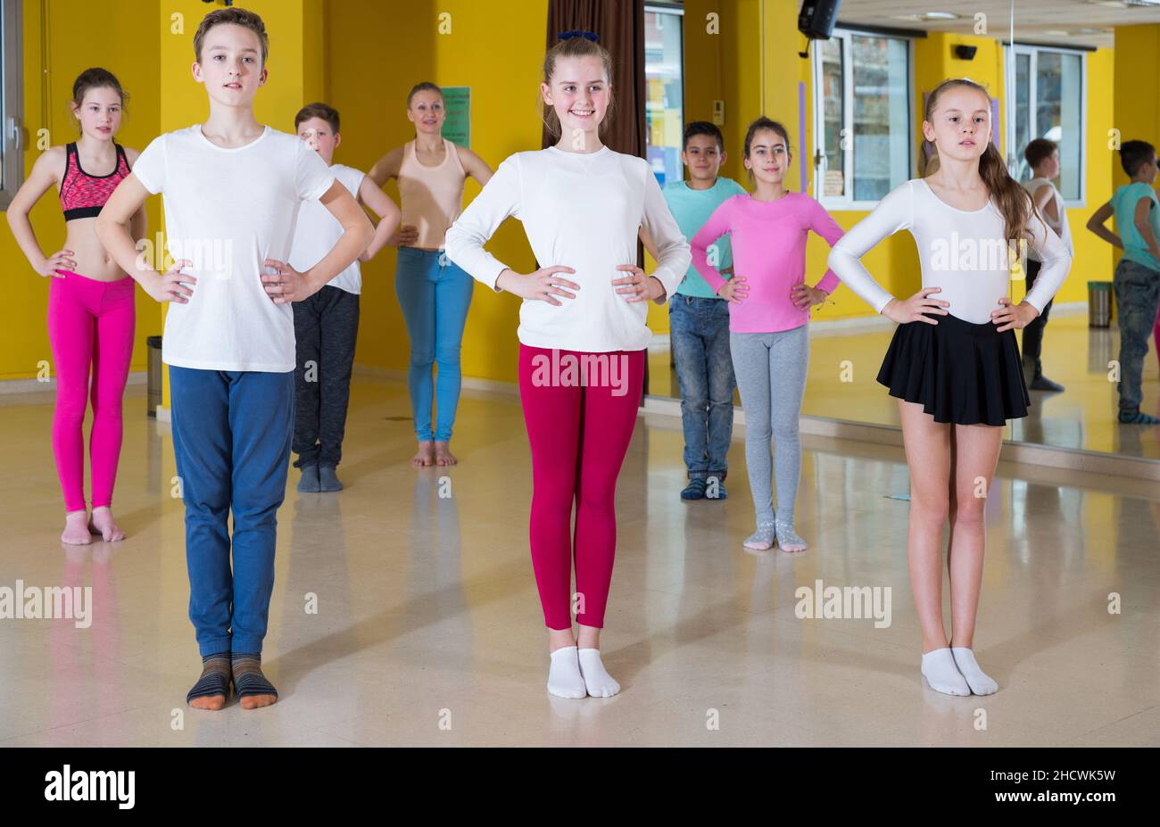 Teenagers practicing dance in studio Stock Photo